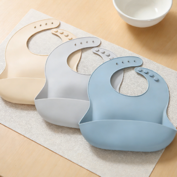 1-Pack Baby silicone bibs, light rust & gray-blue, with food collection bag, dishwasher safe, waterproof and stain-resistant, soft and skin-friendly.